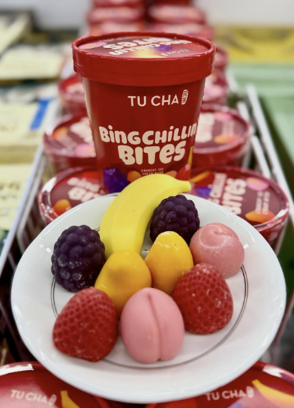 Assorted Bing Chillin’ Bites served in front of TuCha packs in a freezer display